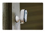 Arlo Essential Plug-In Security Camera attached to a wooden post.