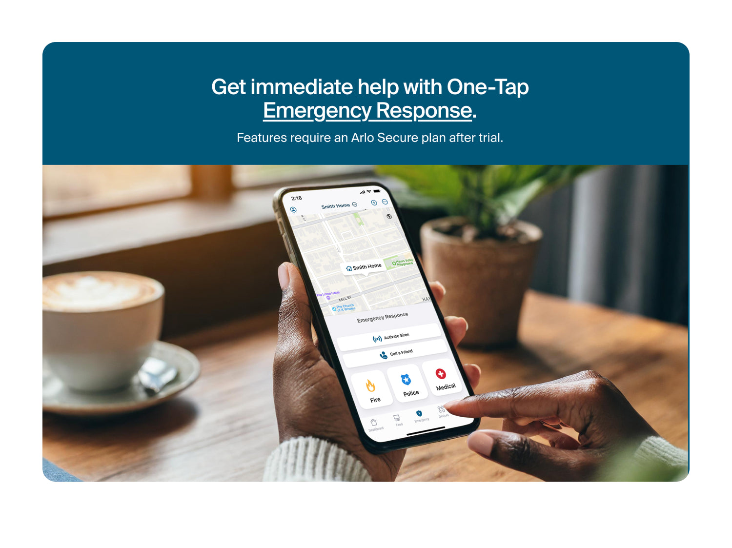Promotional graphic for Arlo Secure app, showing a person holding a smartphone with the app interface displayed on the screen, with a coffee cup and potted plant in the background. A dark blue banner at the top reads: 'Get immediate help with One-Tap Emergency Response.
